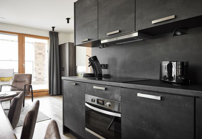 Ferienwohnung in Gargellen - Zwei-Schlafzimmer-Apartment mit zwei Doppelbetten und einem Etagenbett  Ferienwohnung in Gargellen - Zwei-Schlafzimmer-Apartment mit zwei Doppelbetten und einem Etagenbett