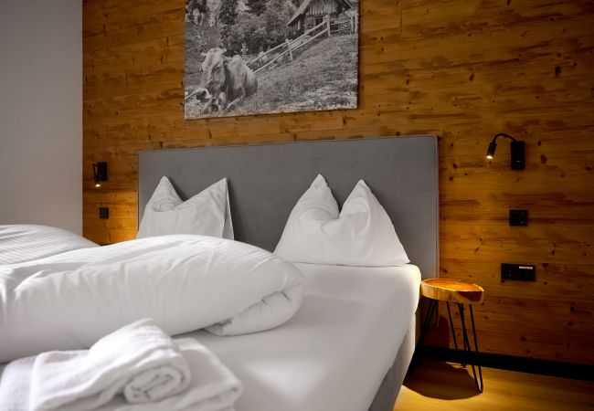 Ferienwohnung in Gargellen - Zwei-Schlafzimmer-Apartment mit zwei Doppelbetten und einem Etagenbett  Ferienwohnung in Gargellen - Zwei-Schlafzimmer-Apartment mit zwei Doppelbetten und einem Etagenbett