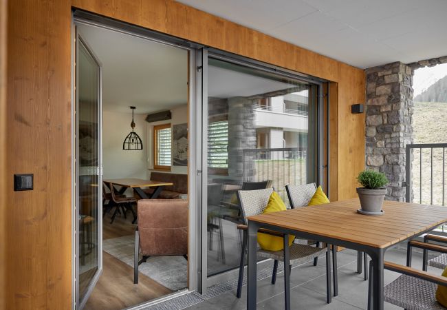 Ferienwohnung in Gargellen - Zwei-Schlafzimmer-Apartment mit zwei Doppelbetten und einem Etagenbett  Ferienwohnung in Gargellen - Zwei-Schlafzimmer-Apartment mit zwei Doppelbetten und einem Etagenbett