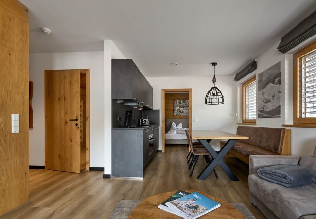 Ferienwohnung in Gargellen - Zwei-Schlafzimmer-Apartment mit zwei Doppelbetten und einem Etagenbett  Ferienwohnung in Gargellen - Zwei-Schlafzimmer-Apartment mit zwei Doppelbetten und einem Etagenbett