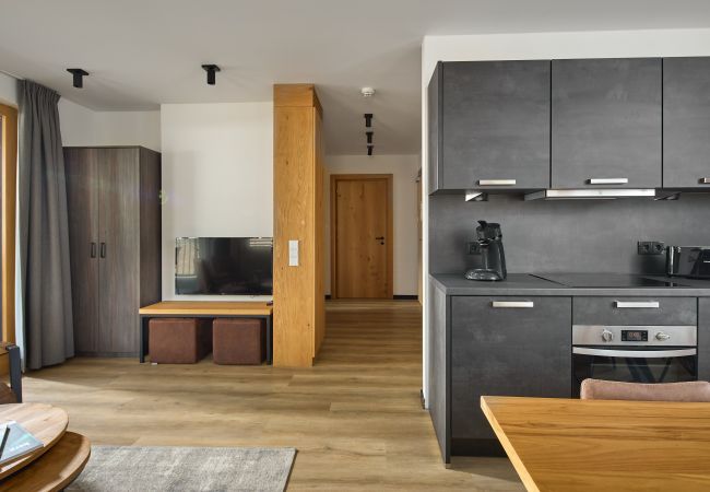 Ferienwohnung in Gargellen - Zwei-Schlafzimmer-Apartment mit zwei Doppelbetten und einem Etagenbett  Ferienwohnung in Gargellen - Zwei-Schlafzimmer-Apartment mit zwei Doppelbetten und einem Etagenbett