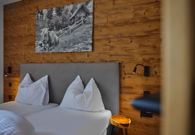 Ferienwohnung in Gargellen - Zwei-Schlafzimmer-Apartment mit zwei Doppelbetten und einem Etagenbett  Ferienwohnung in Gargellen - Zwei-Schlafzimmer-Apartment mit zwei Doppelbetten und einem Etagenbett